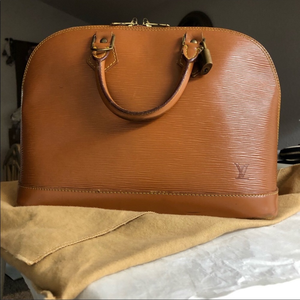 Authentic Louis Vuitton Alma Epi leather bag
